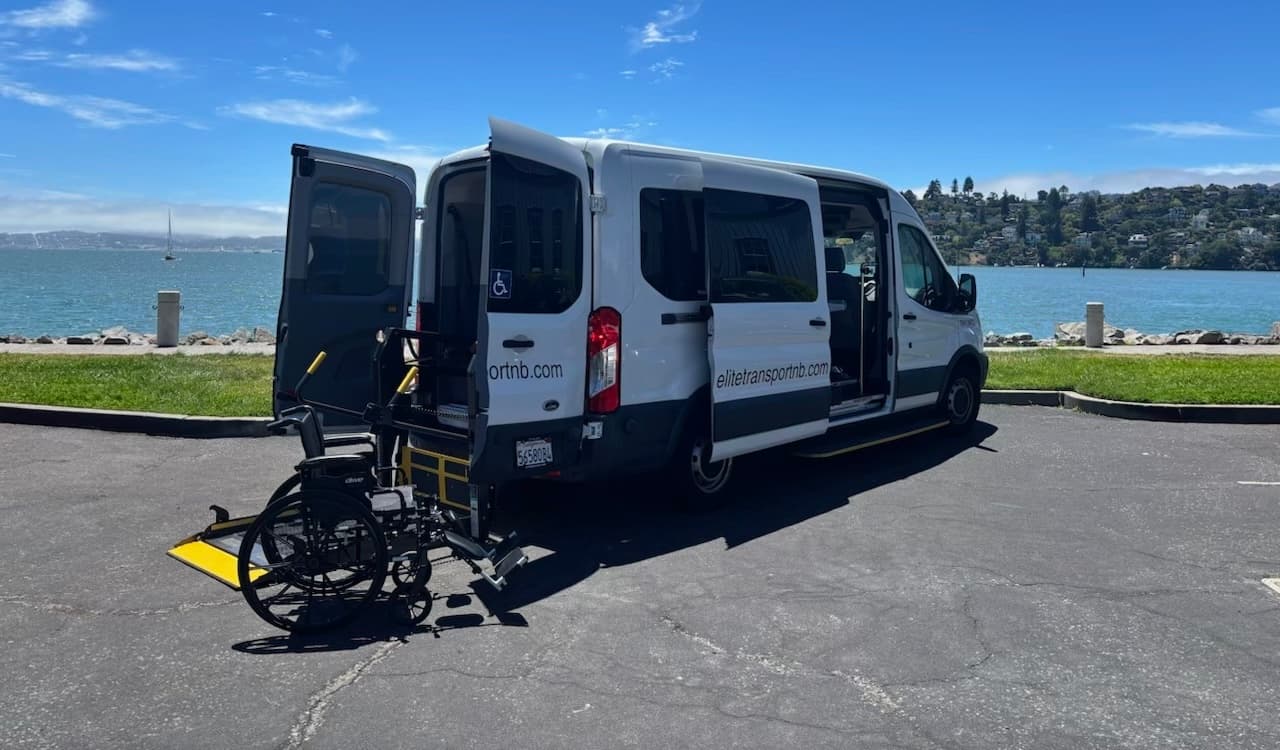 Elite Transport wheelchair-accessible van at the North Bay waterfront
